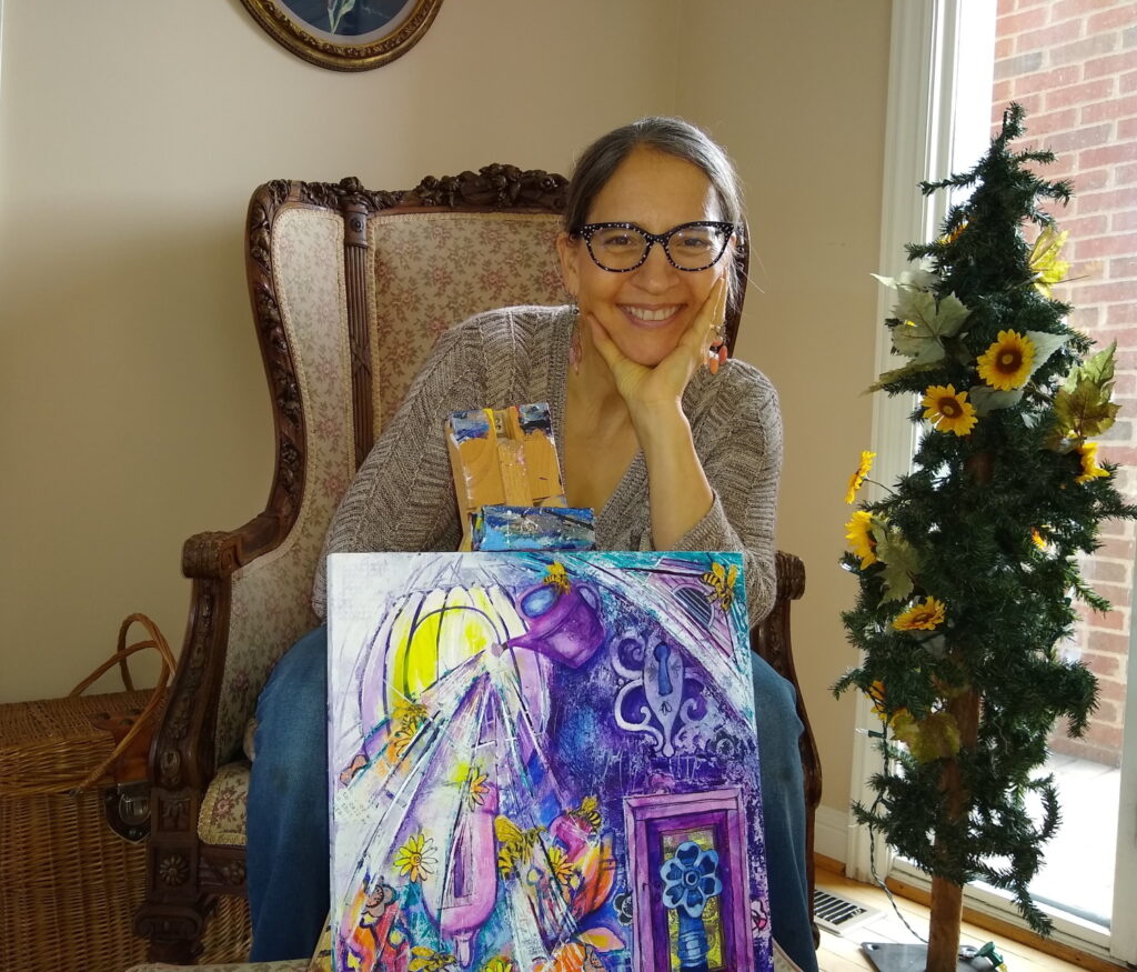 Alisa Clark with her latest mindfulness painting.